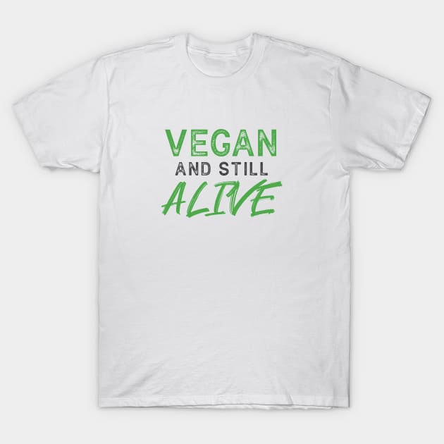 VEGAN and still ALIVE - Funny Message T-Shirt by SeaAndLight